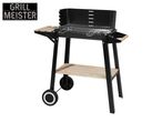Black charcoal grill with side shelves, bottom storage rack, and wheels, with 'GRILL MEISTER' text.