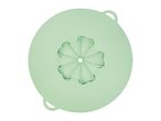 A light green silicone steamer basket with flower-shaped holes and two handles.