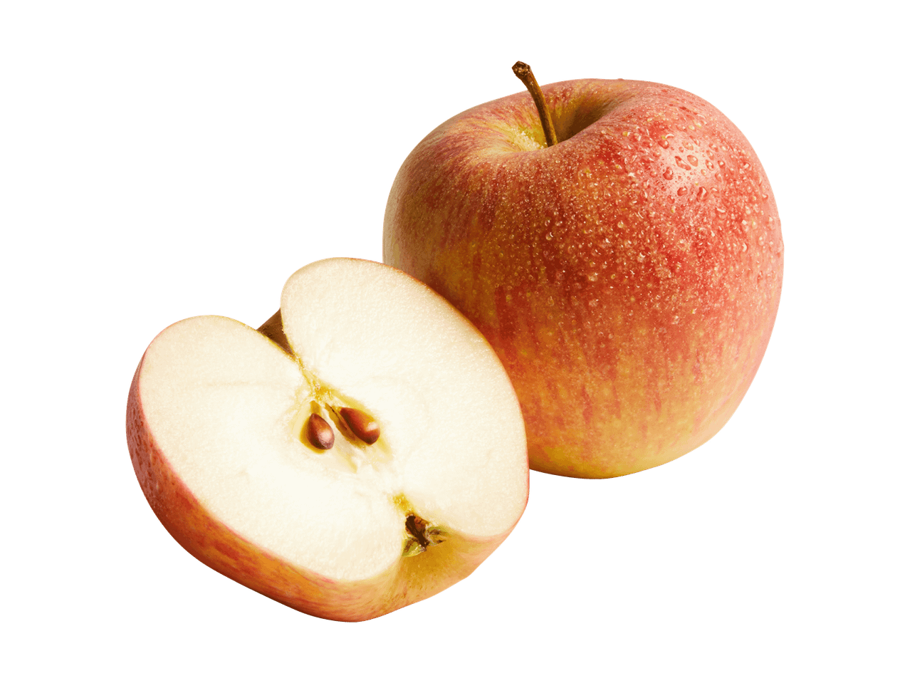 Ein ganzer Apfel und ein halber Apfel auf schwarzem Hintergrund.