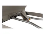 Close-up of a beige sun lounger's adjustable mechanism with metal bars and orange accents.