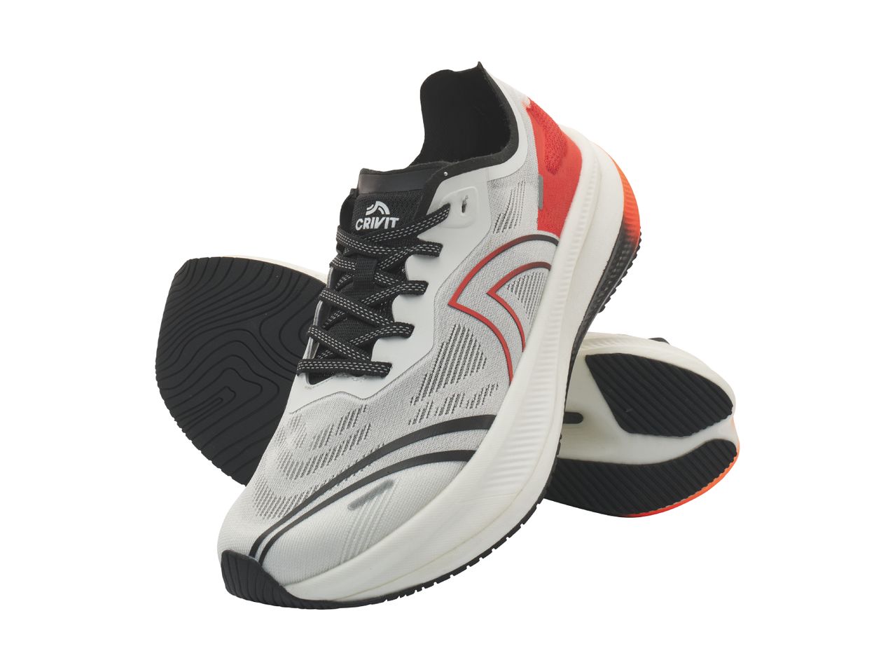 Pair of white and red athletic shoes with black laces and soles