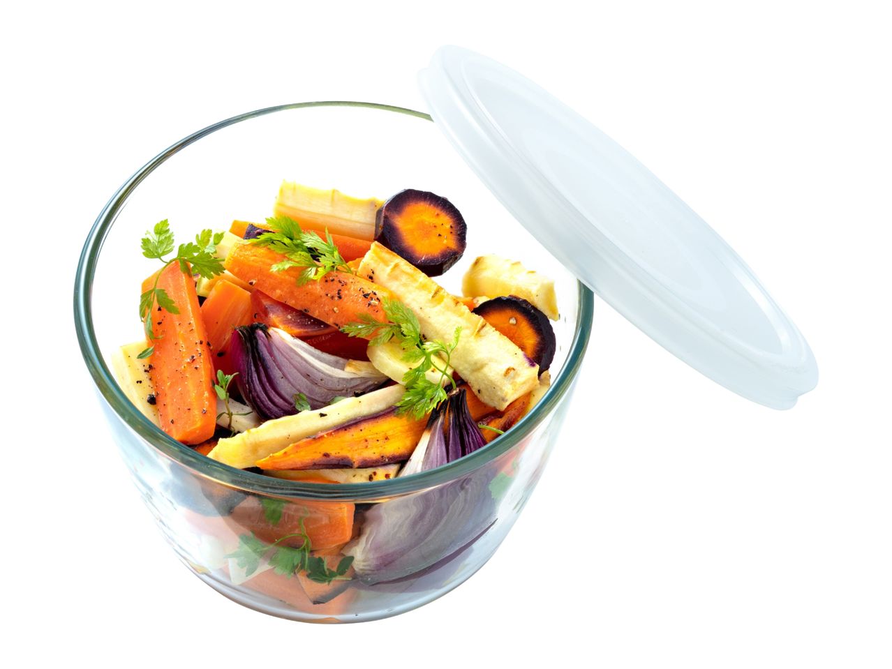 Glass bowl filled with roasted carrots, parsnips, and red onions, with a lid beside it.