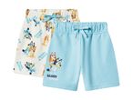 Two pairs of children's shorts, one white with Bluey and Bingo print, one light blue with Bluey and Bingo print.