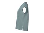 Light blue women's short-sleeved top with side slits, side view.