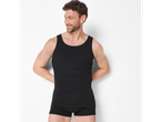 Man in black tank top and boxer briefs, smiling and looking to the side.
