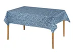Blue tablecloth with white polka dots on a wooden table.