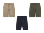 Drei Jogginghosen in Beige, Olivgrün und Dunkelblau.