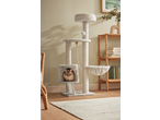 Zoofari Cat Activity Tower with a cat inside, next to a wooden shelf with books.