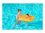 Woman and child in a pool, child in a yellow inflatable baby seat with a crab design.