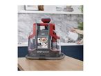 Vax Spotwash carpet cleaner sits on a kitchen counter.