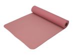A pink yoga mat, partially unrolled, on a white background.