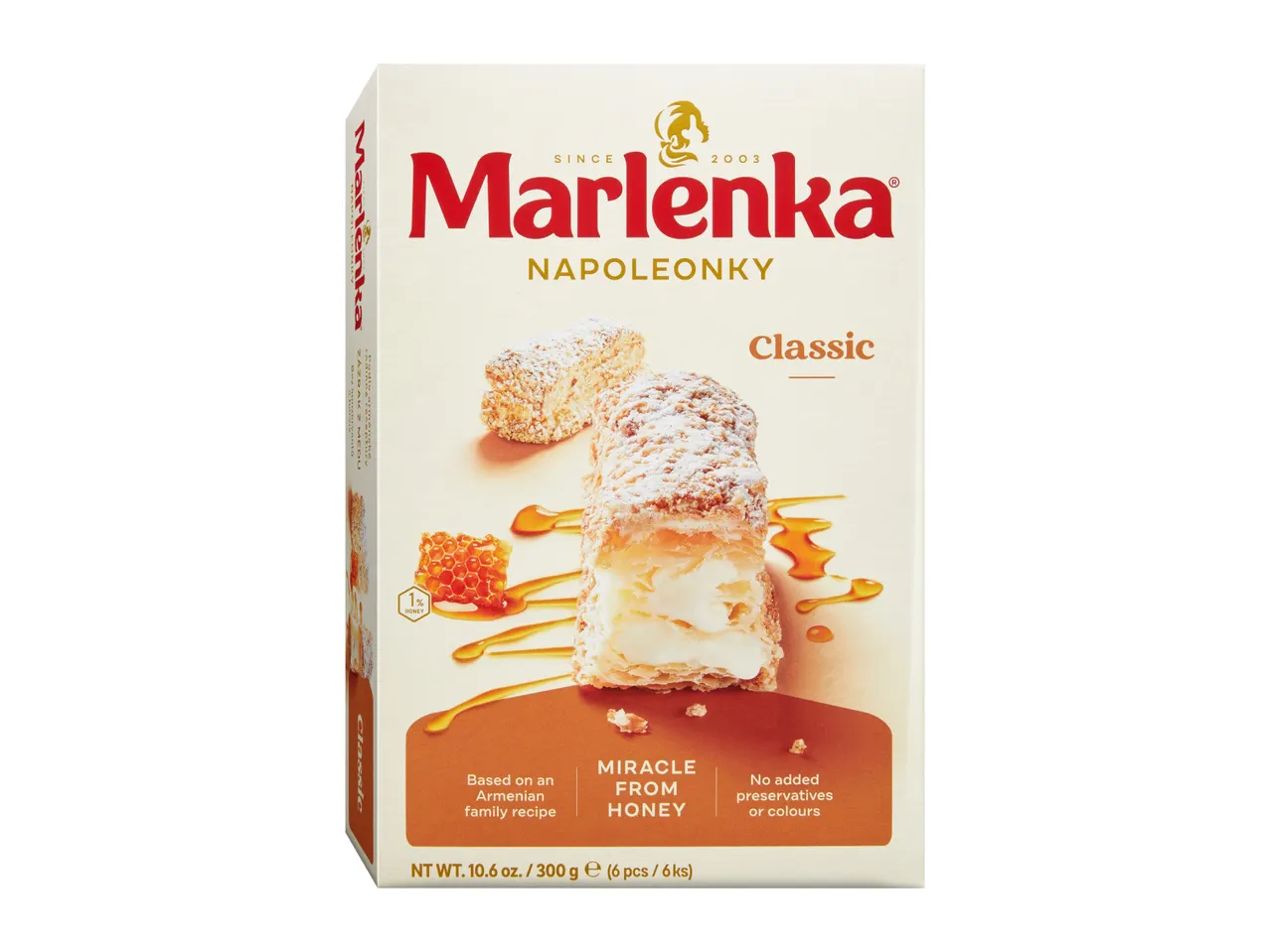A box of classic Napoleonky pastries with honey, featuring a pastry and honeycomb.
