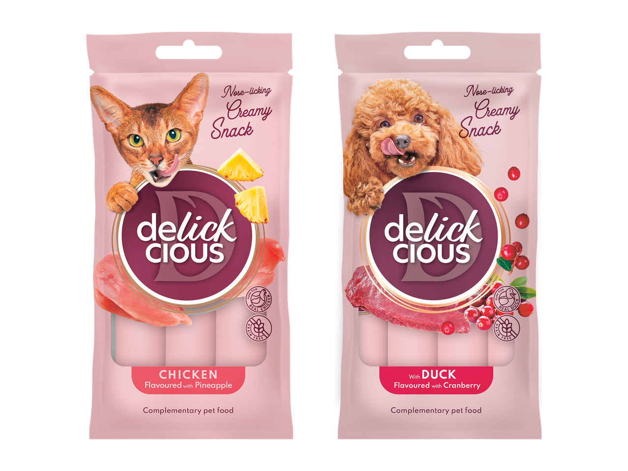 Două pachete de gustări cremoase pentru animale de companie, cu pui și ananas, respectiv rață și merișoare.