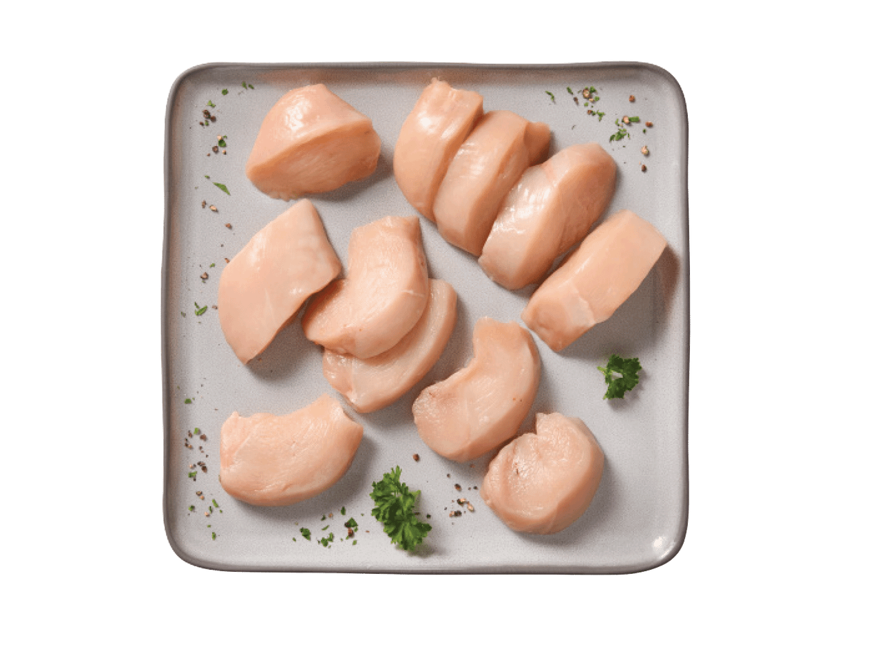 Toores kanafilee tükid taldrikul, kaunistatud ürtide ja pipraga