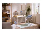 Home office with a wooden desk, white chair, and a tall wooden bookshelf.