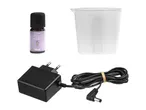 Accessories for an aroma diffuser, including lavender oil, a measuring cup, and a power adapter.