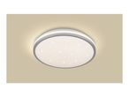 Round ceiling light with a starry sky effect, illuminating a beige ceiling.