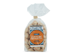 Een zak kaneelkussens met een oranje etiket met de tekst 'KANEEL KUSSENS DE SMAAK VAN VROEGER'.