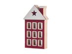 Red and white wooden house decoration with a star cut-out on the roof