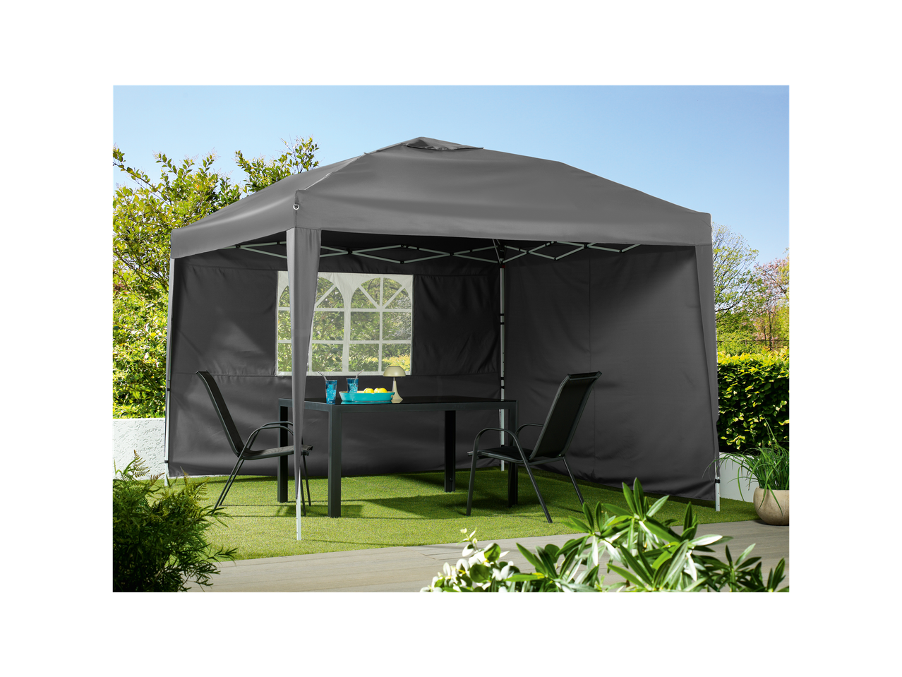Garden gazebo with table and chairs.