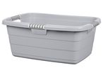A gray plastic laundry basket with gray and white handles.