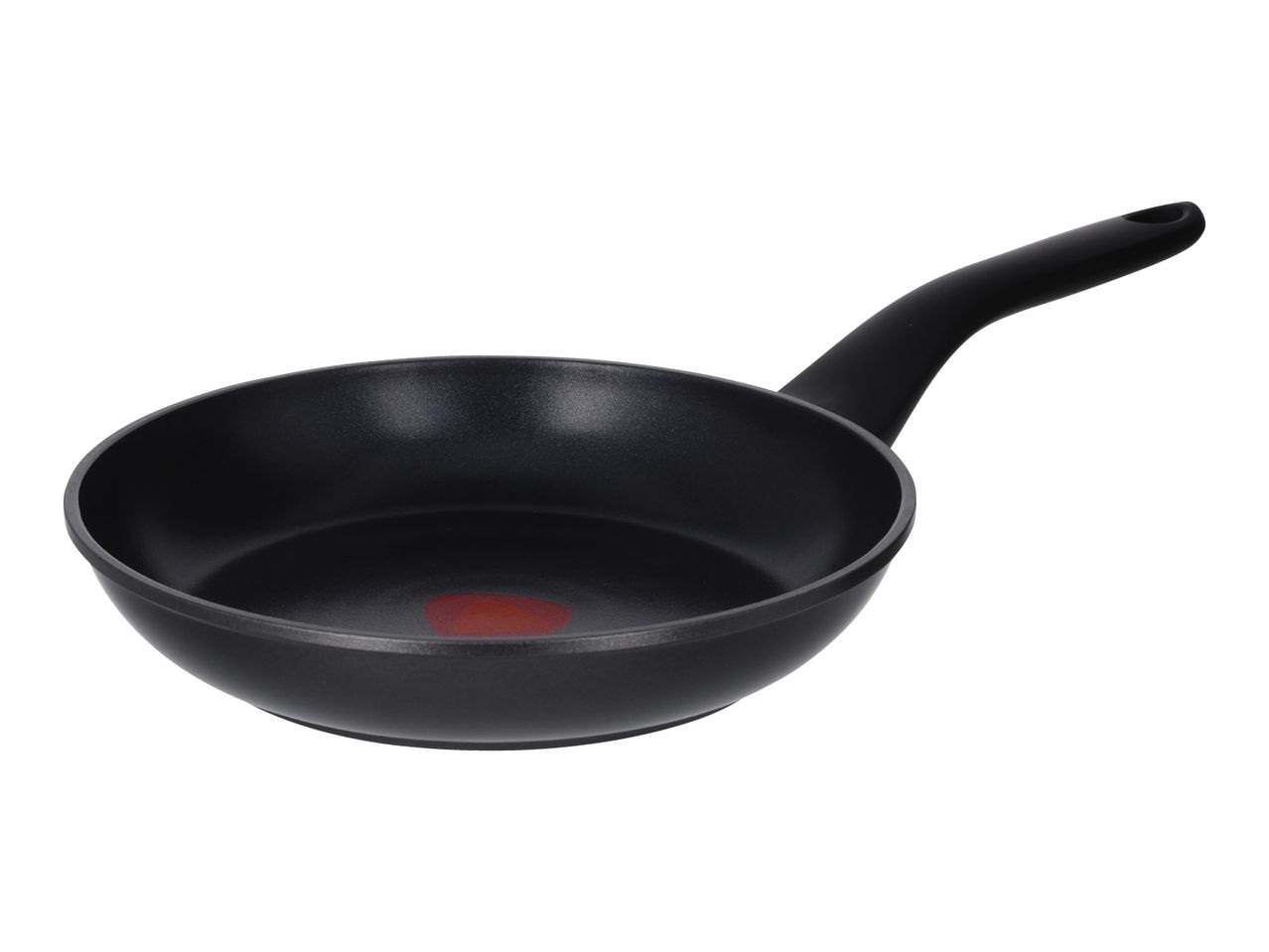 Black frying pan with a red heat indicator in the center