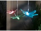Solar-powered dragonfly string lights add whimsical charm to any outdoor space.