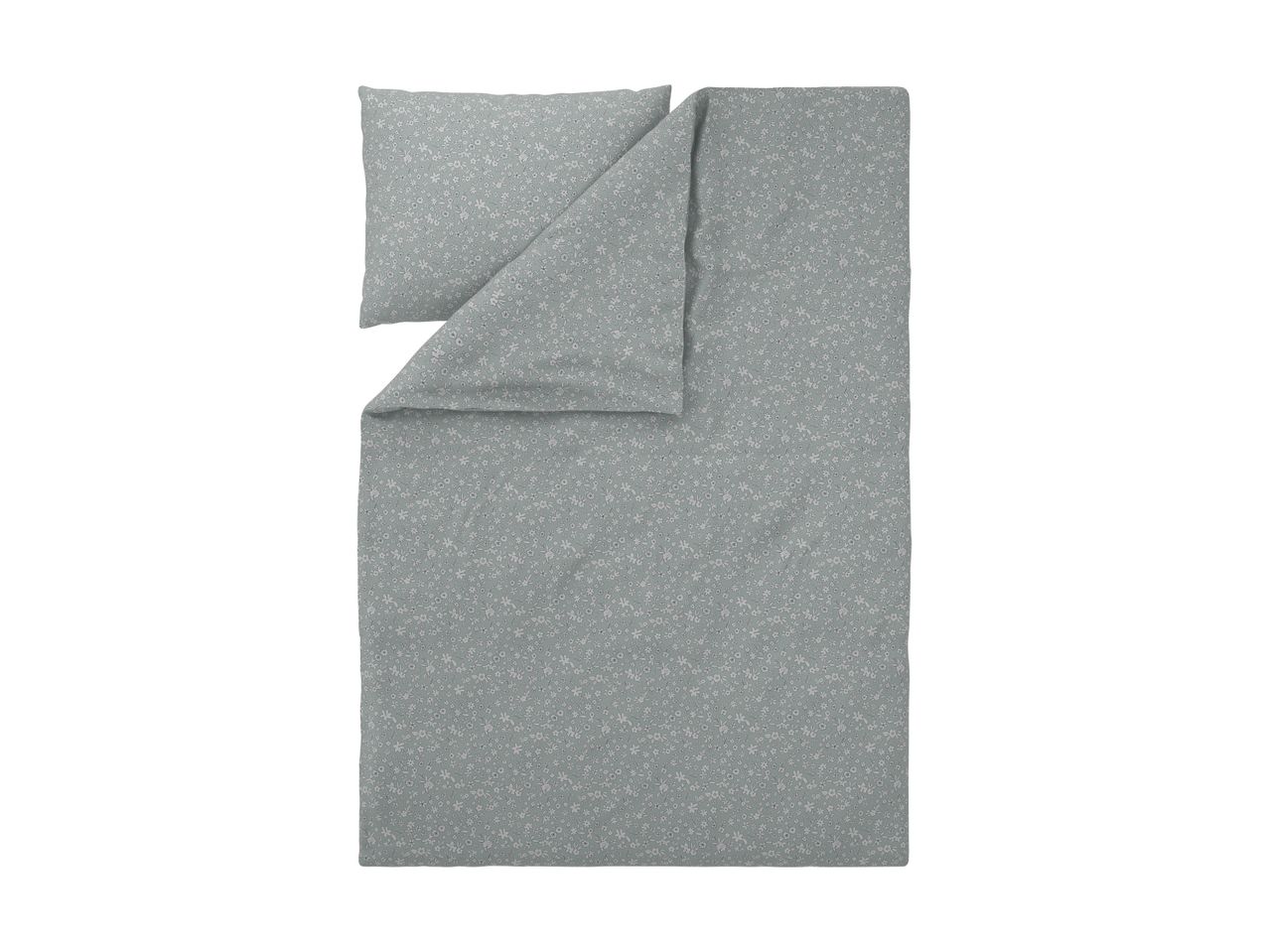 Light green duvet cover and pillowcase set with a delicate white floral pattern.