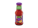 En flaske sød chilisauce i thailandsk stil, mærket som medium styrke, 250 ml.