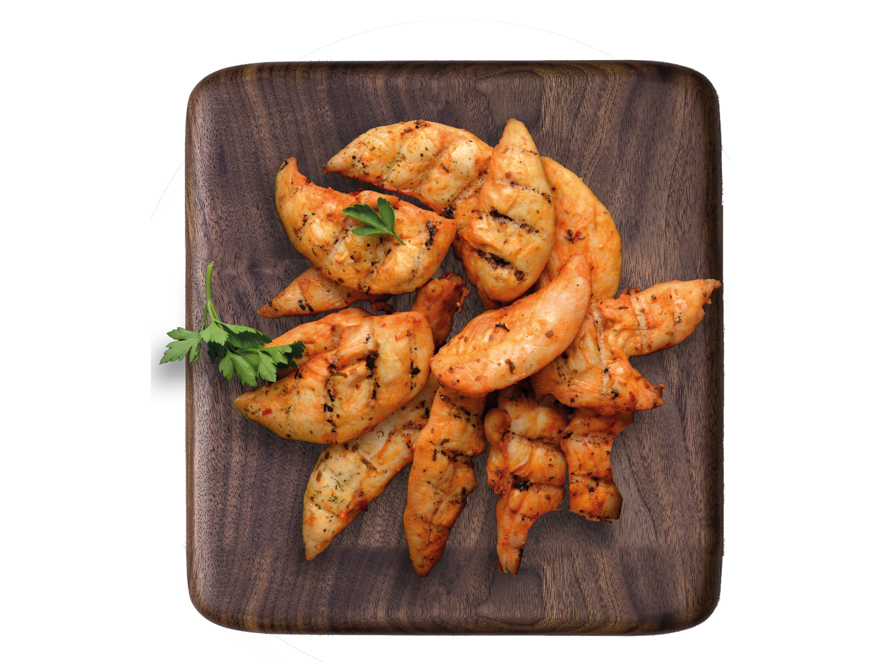 Kepti vištienos juostelės ant medinės lentelės.