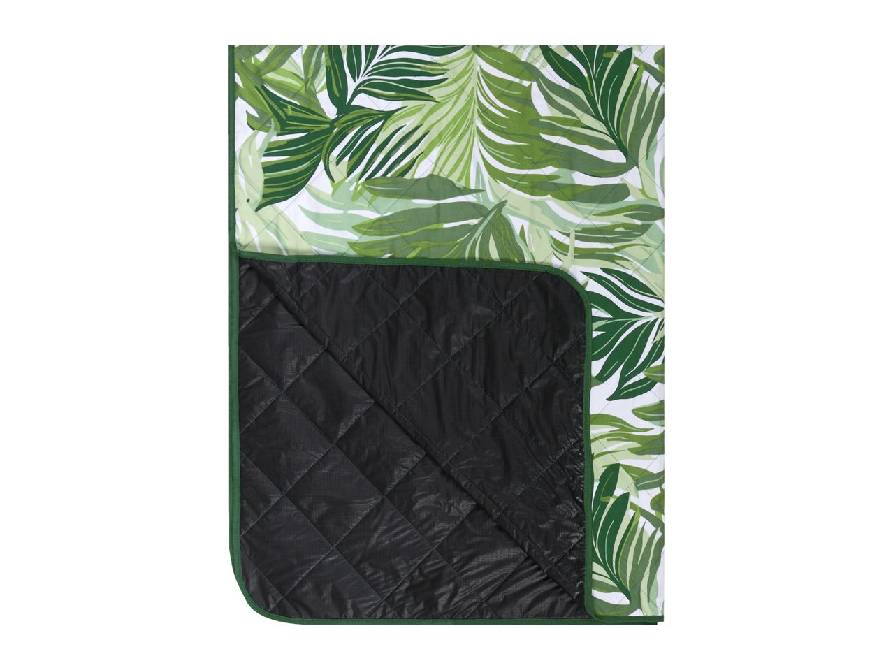 Green tropical leaf print picnic blanket with a black quilted underside.