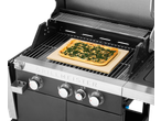 Gas grill with a rectangular pizza on a pizza stone inside.