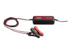 Car battery charger with red and black clamps and a digital display