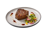 Filete de salmão FISCHERSTOLZ com guarnição de vegetais e molho.