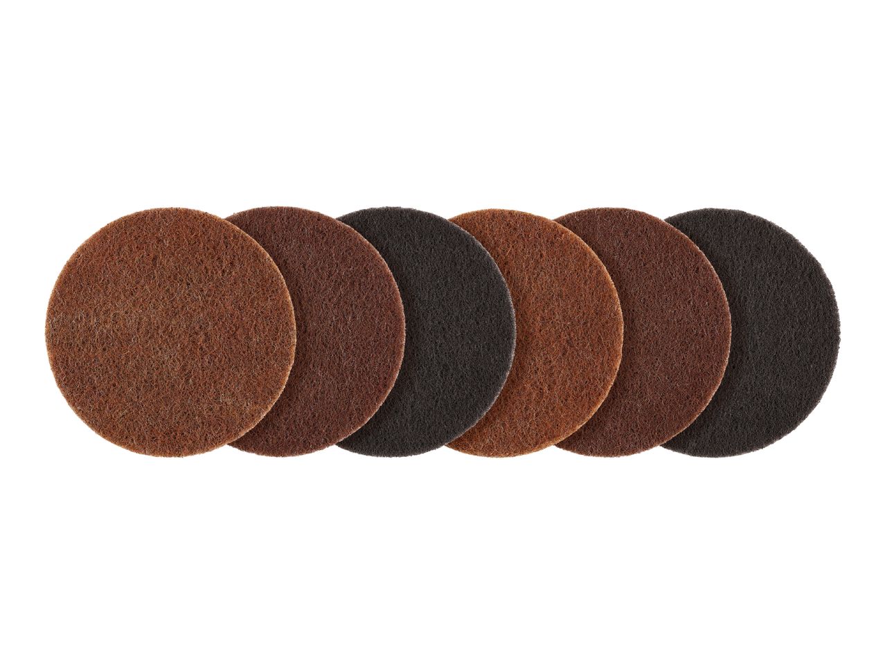 Six round abrasive pads in varying shades of brown and black, arranged in a row.