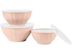 Set of three peach-colored mixing bowls with white lids, one bowl open with lid askew.