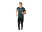 Man in a dark green camouflage print sports t-shirt and black running leggings.
