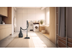 Vacuum cleaner on a rug in a modern laundry room with a washing machine.