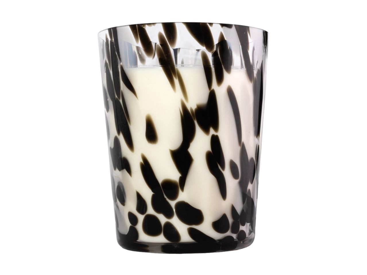 Scented candle in a decorative black and white spotted glass jar