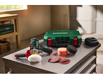 PARKSIDE® 12V Cordless Polisher/Sander with accessories on a metal workbench.
