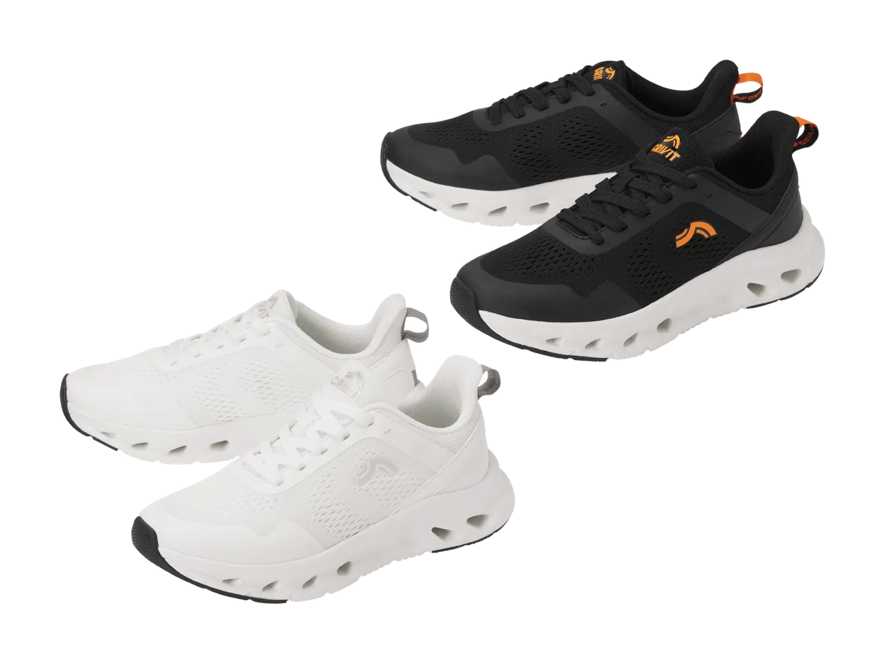 Zwei Paar Sportschuhe, ein schwarzes und ein weißes, mit perforierten Sohlen.