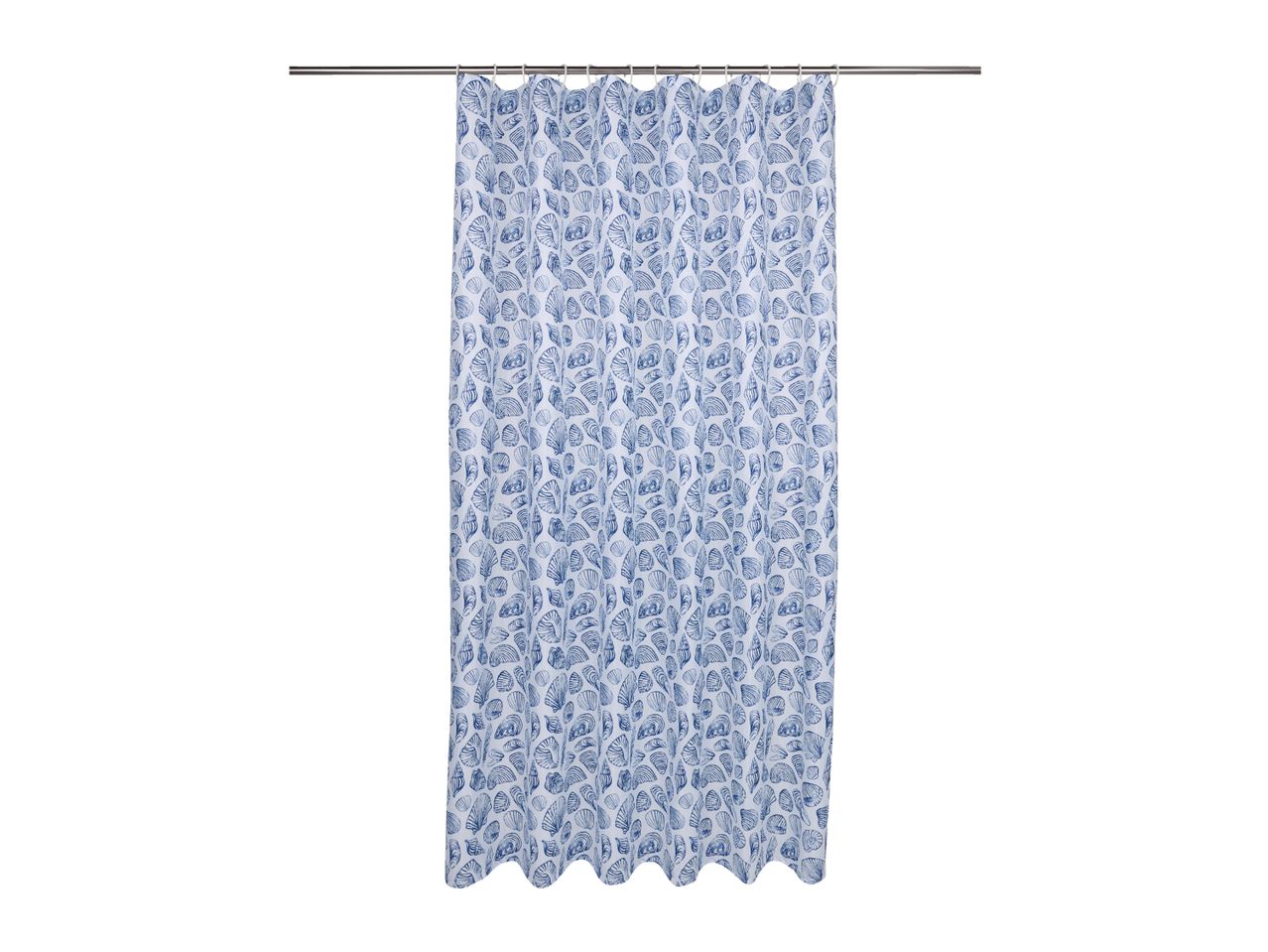 White shower curtain with a blue seashell pattern hanging on a silver rod