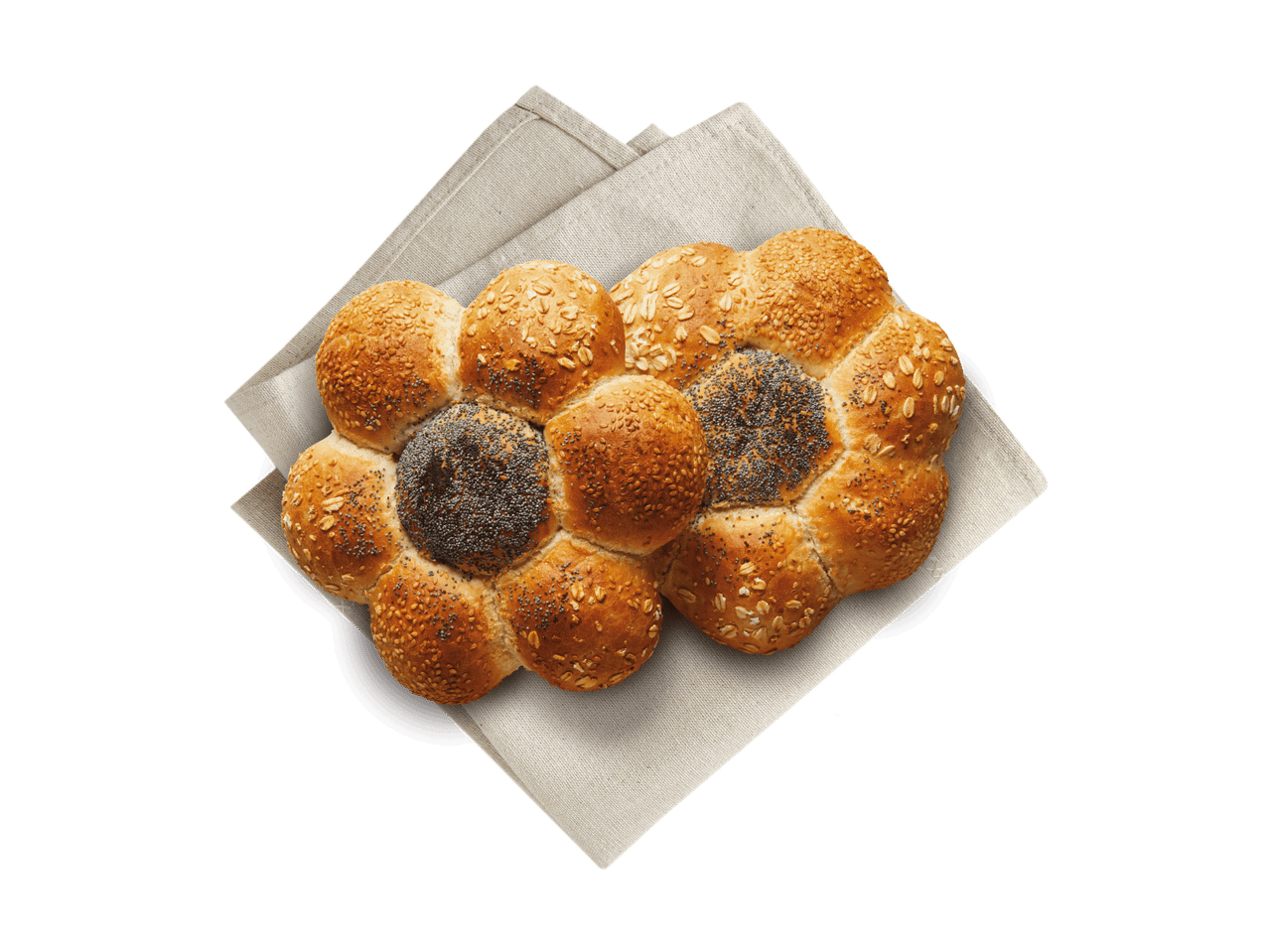 Blumenförmiges Brot mit Mohn, Haferflocken und Sesam auf einem Leinentuch.