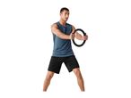 Man in sportswear holding a Pilates ring, exercising.