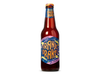 Fles kruidige tripel bier met een kleurrijk etiket met de tekst 'Oranje Orakel Spiced Tripel 8.0%'