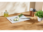 SILVERCREST® Chopping Boards with sliced zucchini, olive oil, and spices on a wooden table.