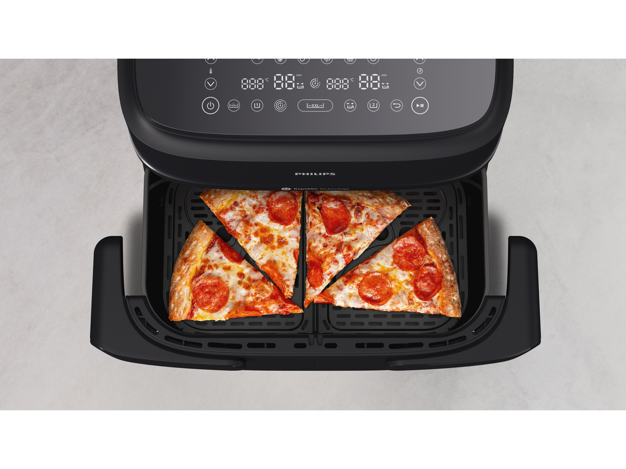 Philips Air Fryer with four slices of pepperoni pizza, with digital display