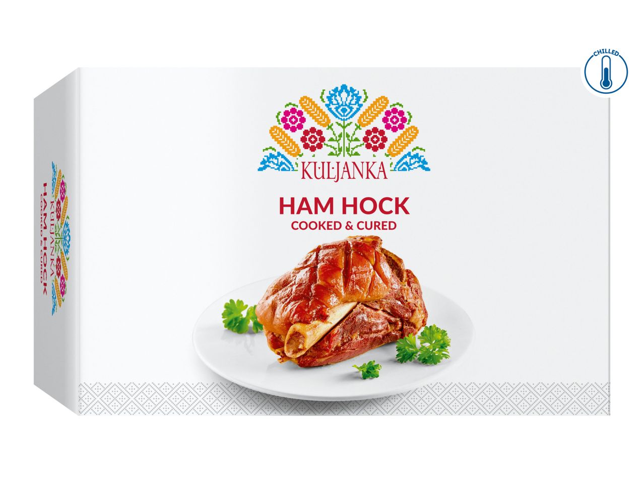 Kuhne Ham Hock, pre-cooked in foil, shown on a plate with garnish.