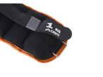 Black ankle weight with orange trim and '1 KG CRIVIT' text