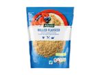 Milled flaxseed in a blue resealable bag, with a serving suggestion of oatmeal with berries.